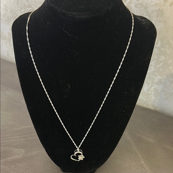 Sterling silver Necklace with diamond paw design.